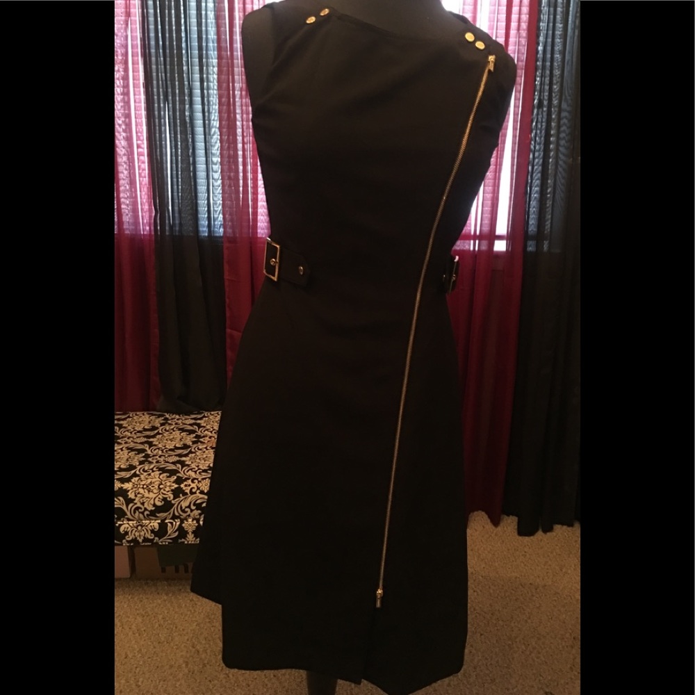 Black dress with gold accents and zipper